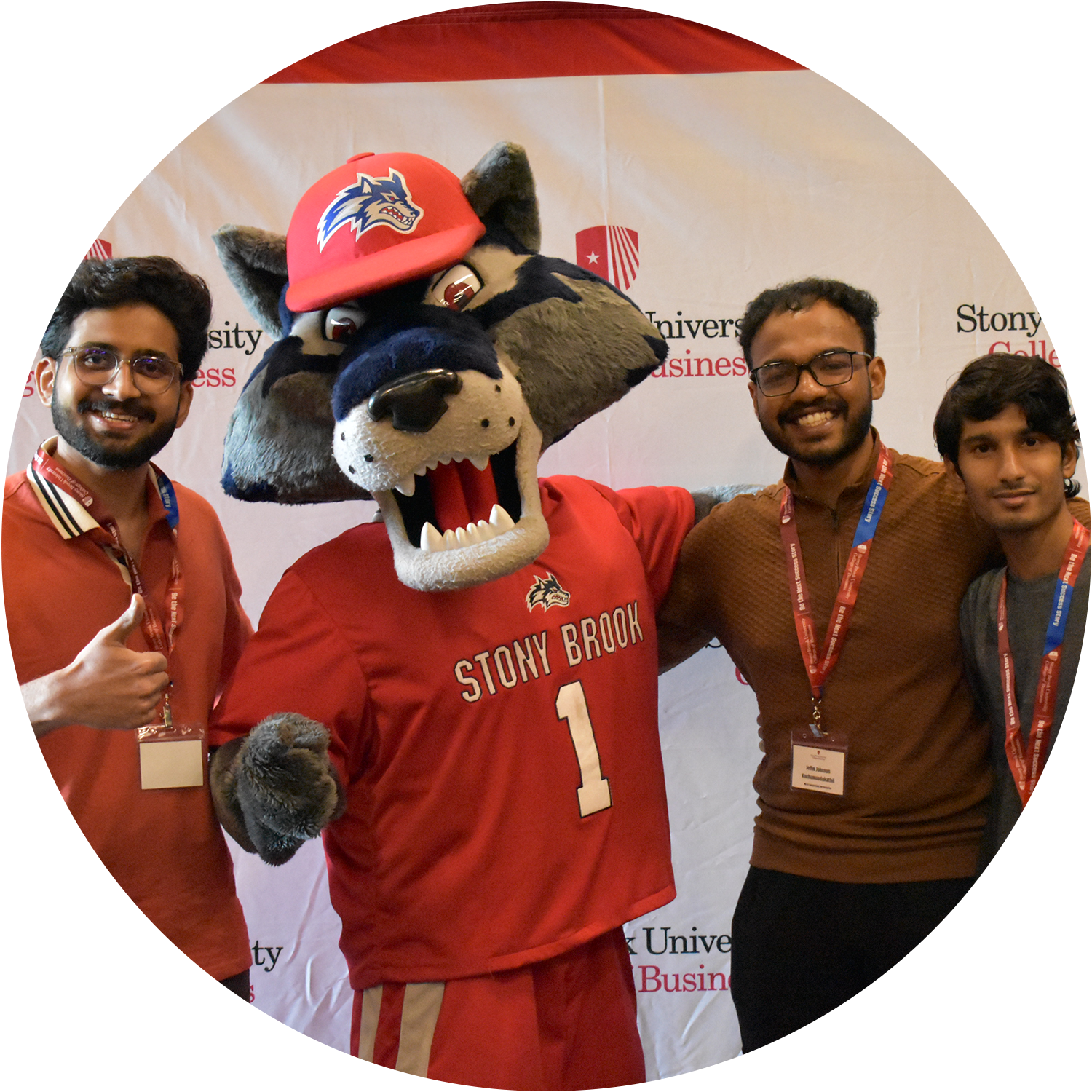 SUNY Stony Brook University College of Business International Studies Posing for Picture with Mascot Wolfie at an Event
