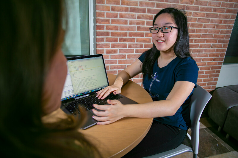 student with computer coding